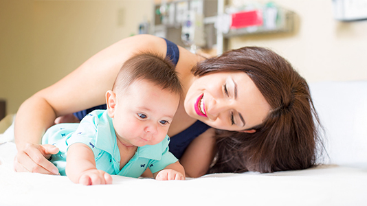 mom and child doing tummy time